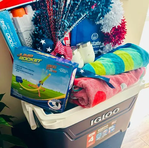 A colorful collection of toys and towels adds a little fun to a community giveaway.