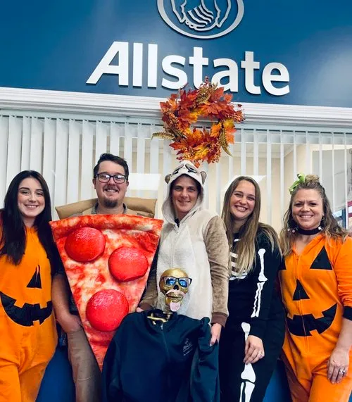 Alexis Goines, Justin Washvill, and the team bring plenty of personality and pizza-themed fun to a Halloween gathering at The Goines Agency.